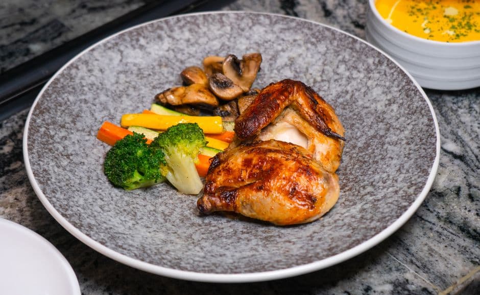 roasted half chicken with greens